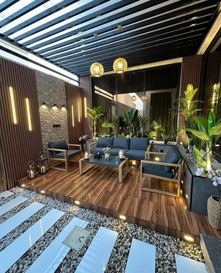 تصميم جلسات خارجيةفي القطيف|أحدث مظلات وسواتر حدائق 2027